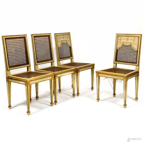 Quattro sedie in legno intagliato, laccato e dorato con seduta e schienale in vimini, cm 92x41x48, XX secolo, (rotture alle componenti in vimini, cadute di laccatura e doratura, usura del tempo)