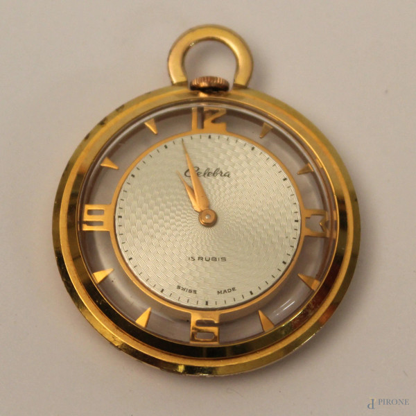Orologio da tasca in metallo dorato e plexiglass.