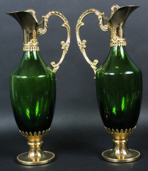 Coppia di caraffe in vetro verde con prese in metallo dorato, altezza max 29 cm, (lievi difetti)