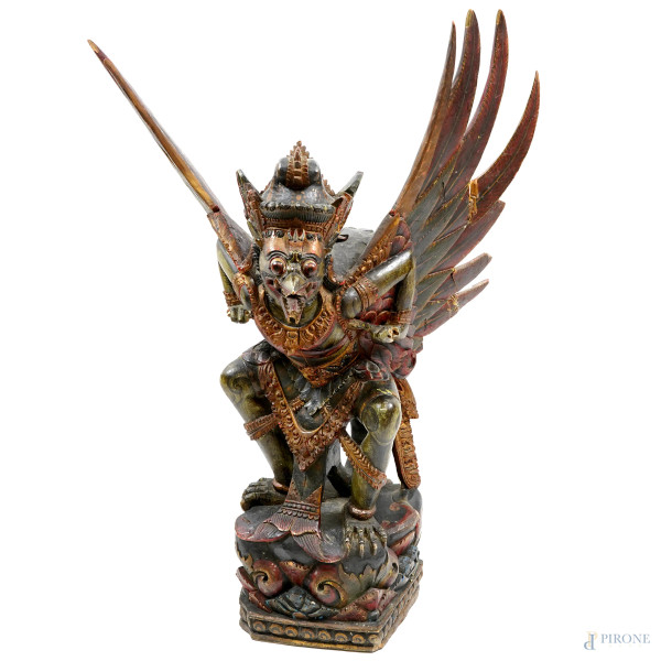 Garuda, Indonesia, XX secolo, legno policromo, altezza cm 93, (difetti, rotture)