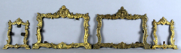 Lotto composto da quattro cornicette in bronzo cesellato e dorato, 30x38 cm,  - 21x18 cm.