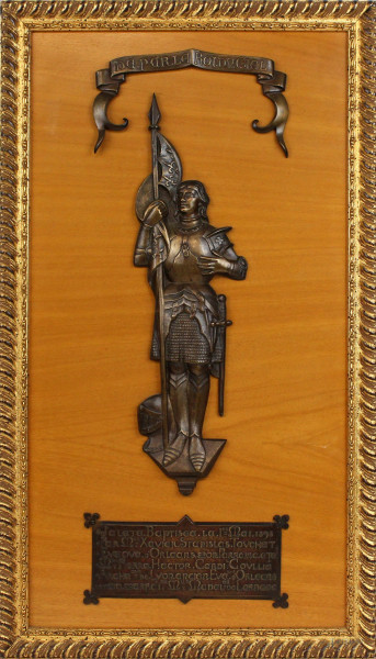 Quadro battesimale con figura di Giovanna d'Arco in armatura ed iscrizione a rilievo in bronzo, cm 39,5x30,5, XIX secolo, entro cornice.