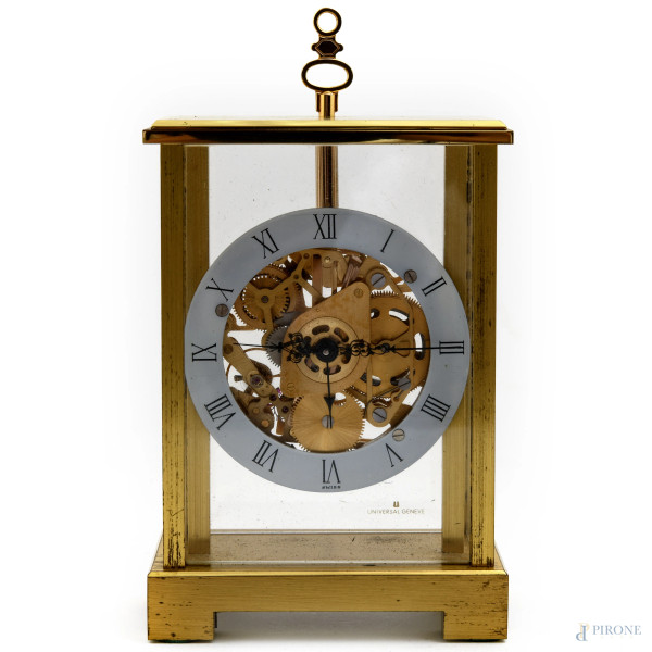 Orologio cappuccina in bronzo dorato con chiavetta come elemento apicale, quadrante circolare con numeri romani emeccanisco centrale a vista, cm 14x7,5x4, (da revisionare)
