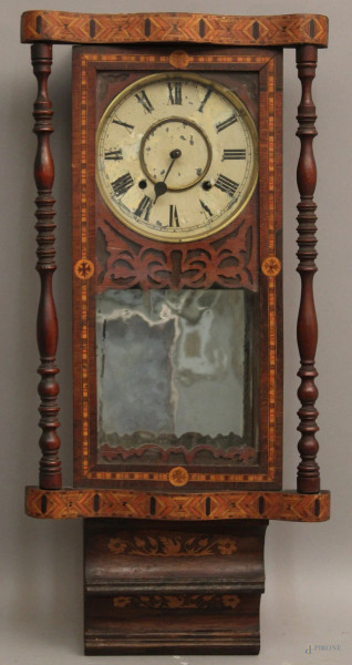Orologio da muro a vari legni ed intarsi geometrici, XIX se, h. 82 cm.