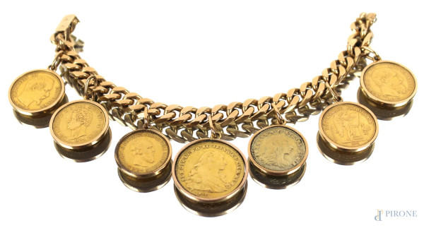 Bracciale in oro 18 kt con applicate a ciondolo 7 monete di epoche diverse, gr. 119,3