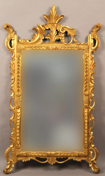 Specchiera in legno intagliato e dorato, altezza 130x72 cm, primi &#39;900, (restauri).
