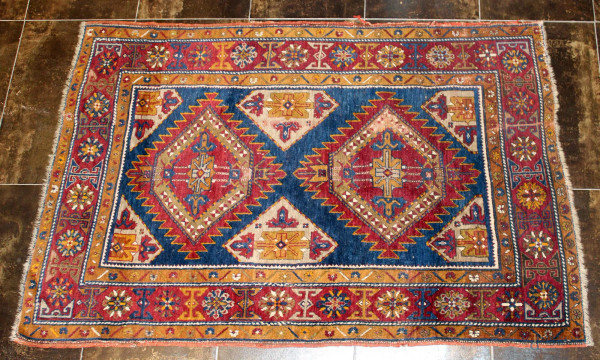 Antico tappeto persiano