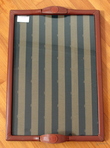 Vassoio in pelle e stoffa marcata Fendi, cm. 65x43.
