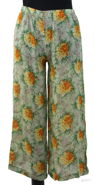 Pantalone palazzo da donna a fantasia floreale, elastico in vita e due tasche, (segni di utilizzo).