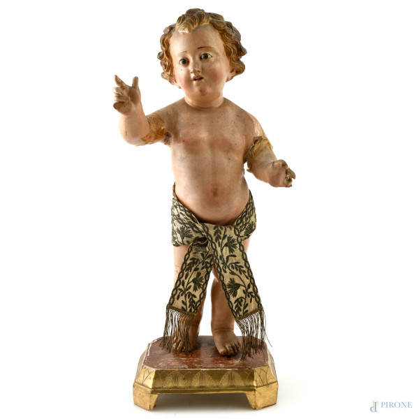 Gesù Bambino in gesso e stucco dipinto su base in legno, XIX-XX secolo, altezza cm 54 circa, (segni di usura, rotture, restauri, mancanze, difetti)