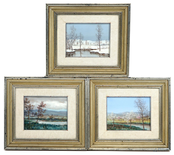 Le stagioni, tre dipinti a tempera su carta, cm 16x20, firmati, entro cornici.
