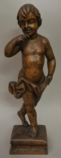 Fanciullo, scultura in legno intagliato,XIX sec, h. 48 cm. 