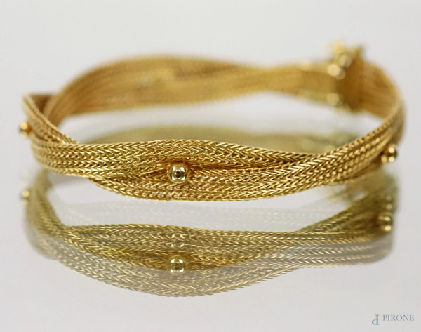 Bracciale in oro 18 KT con lavorazione a maglie intrecciate, lunghezza cm 18, peso gr.14,4