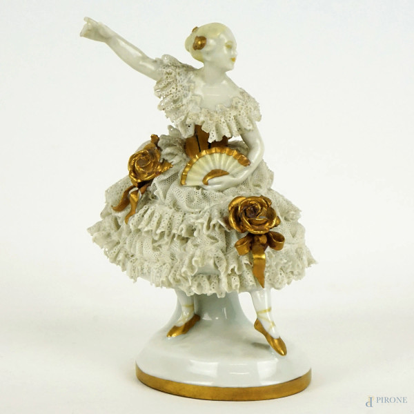 Ballerina, scultura in porcellana, finiture dorate, cm h 13,5, marchio "N coronata" alla base, (difetti).