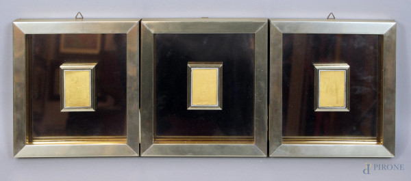 Lotto composto da tre multipli di Cantatore, Lillori e Vespignani su lastra in oro puro, cm. 6x4, entro cornici.