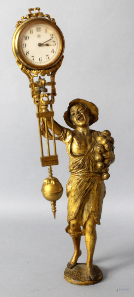 Orologio in bronzo dorato sorretto da fanciullo, altezza 34,5 cm, primi &#39;900, (da revisionare).