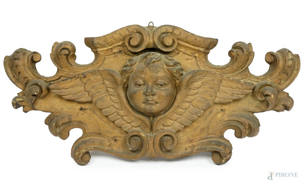 Fregio in legno scolpito e dorato raffigurante testa di putto, cm 50,5x25, XX secolo, (difetti)