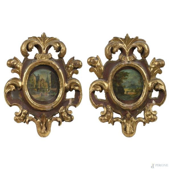 Coppia di miniature raffiguranti paesaggi con architetture e figure, XIX secolo, entro cornice in legno dorato e intagliato, misure complessive cm 25x19, (segni di usura, difetti)