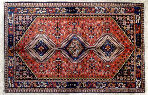 Tappeto caucasico, cm. 160x105.