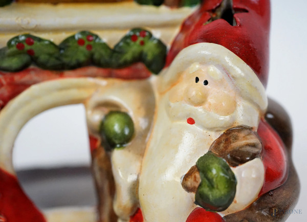 Lotto composto da sette portacandele natalizi, in materiali diversi, alt. cm 18, (lievi difetti)