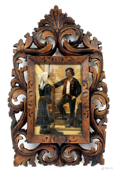 Figure sarde in costume, olio su tela, cm 19,5x13, fine XIX-inizi XX secolo, entro cornice in legno intagliato a motivo di foglie d'acanto.