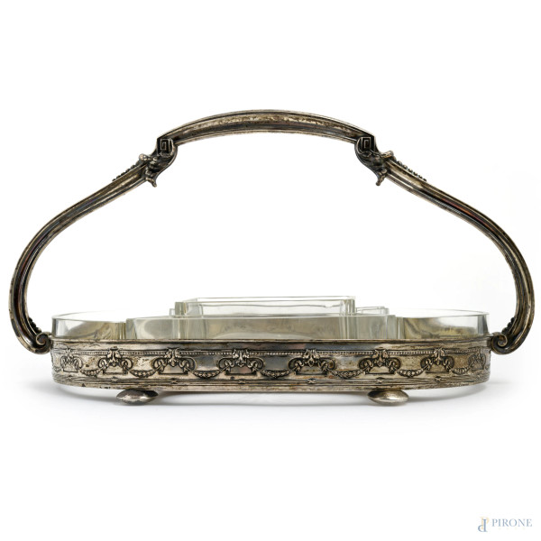 Antipastiera con struttura in metallo e argento 800/000 finemente cesellato e vetro, XX secolo, cm 20x38x22, peso lordo della struttura gr 490, (segni di usura, sbeccature, difetti)