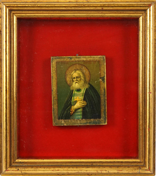 Icona raffigurante Santo, stampa applicata su tavola, cm 9x7, XX secolo, entro cornice