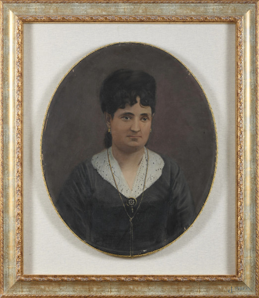 Ritratto di signora, XX secolo, olio su tela a serto ovale, cm 62x51, entro cornice, (segni di usura, abrasioni, cadute di colore)