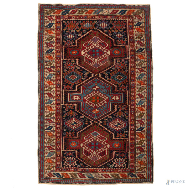 Tappeto, XX secolo, cm 194x115, (segni di usura, difetti)