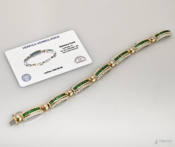 Bracciale in oro bianco 750 con brillanti e smeraldi, peso gr 44,84, lunghezza cm 22, accompagnato da  [..]