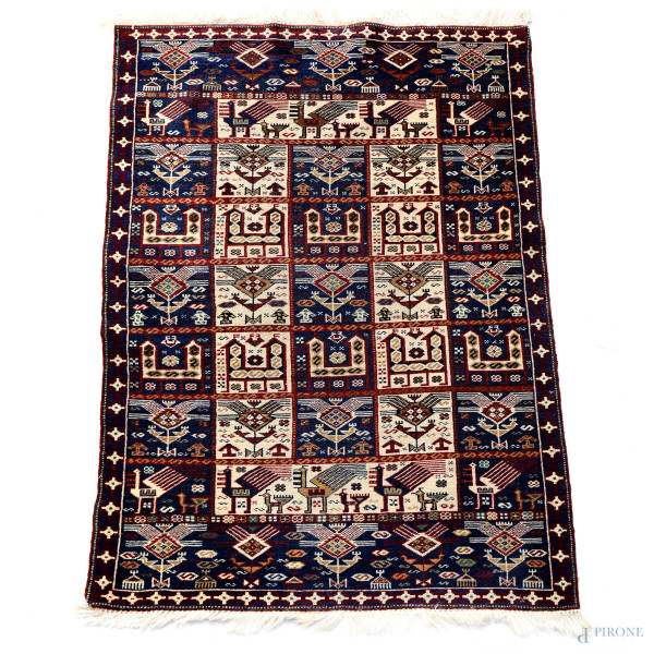 Lotto di tre tappeti, XX secolo, misura massima cm 167x98, (segni di usura)