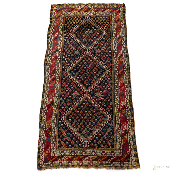 Tappeto, XX secolo, cm 154x340, (segni di usura, difetti)