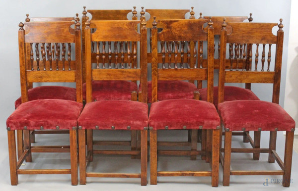 Lotto di due capotavola e sei sedie in legno tinto a noce, seduta in velluto bordeaux