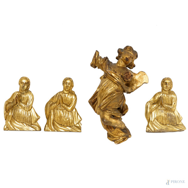 Lotto di quattro sculture in legno dorato di diverse epoche, misura max cm 25x17 (difetti)