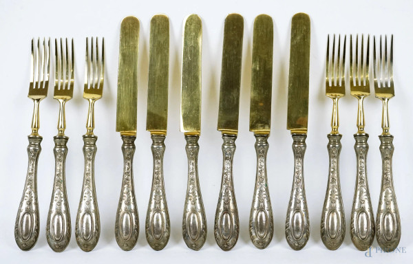 Servizio di posate da dolce, composto da sei coltelli e sei forchette, manici in argento,  prima metà XX secolo.