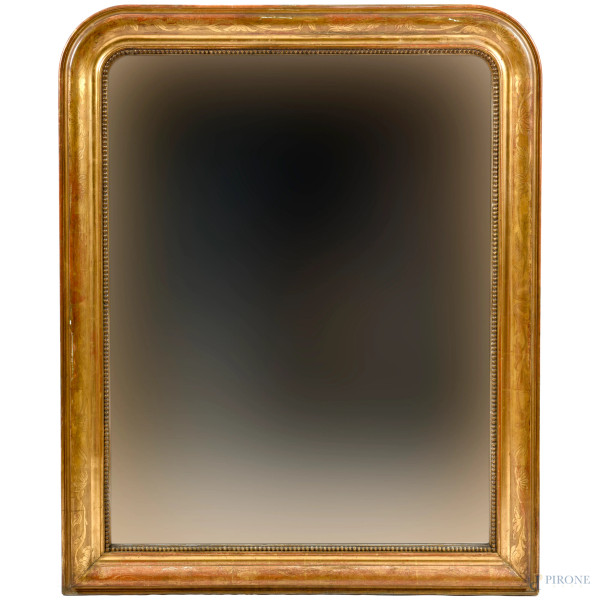 Specchiera in legno intagliato e dorato, XIX-XX secolo, cm 131x106, luce cm 109x85, (difetti)