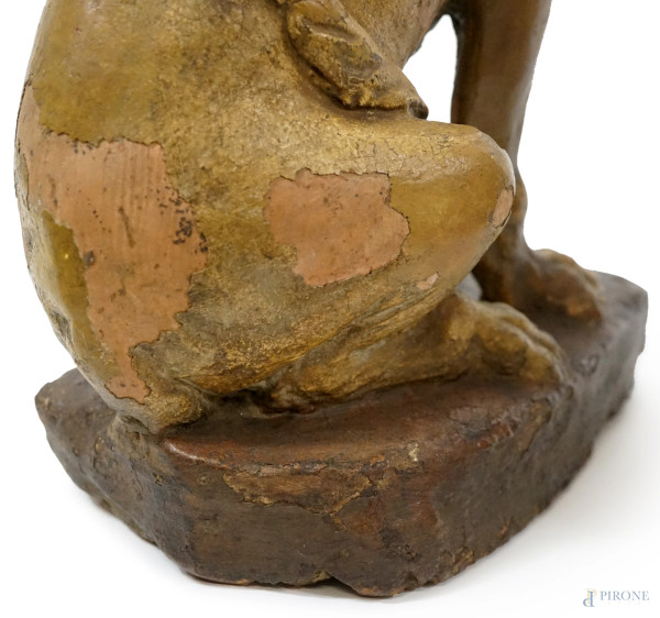 Lotto composto da tre cani in terracotta dipinta, epoche diverse, altezza max cm 34, (difetti)