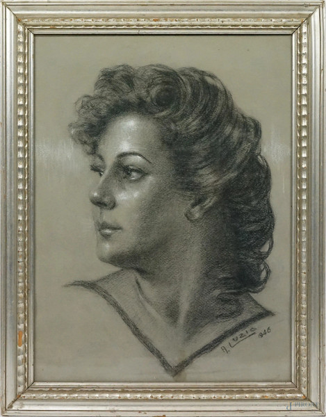 Ritratto di donna, carboncino su carta, cm 42,5x32, firmato e datato, entro cornice