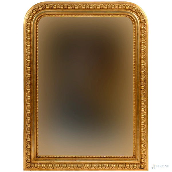Specchiera in legno intagliato e dorato, XX secolo, cm 105,5x79, (difetti)
