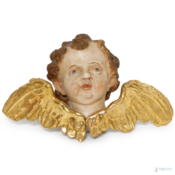 Scultura in legno policromo rappresentante un cherubino, XX secolo, cm 20x31 (difetti)