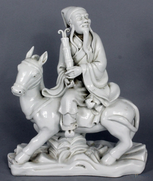 Saggio con cavallo, scultura in porcellana bianca, Cina inizi XX sec. H.22,5cm.