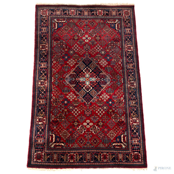 Tappeto, XX secolo, cm 239x148, (segni di usura, difetti)