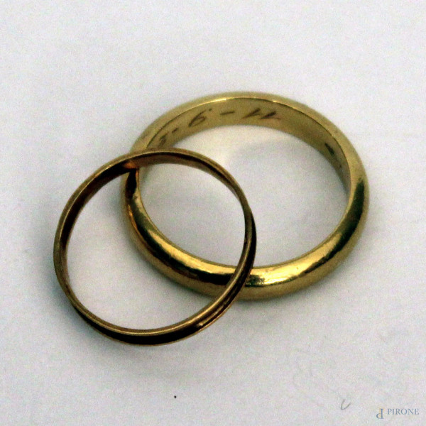 Lotto di due fedi in oro 18 kt.