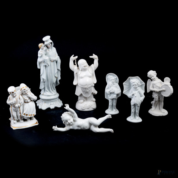 Lotto di sette sculture in bisquit e porcellana di varia foggia e manifattura, XX secolo, altezza massima cm 23, (segni di usura, sbeccature, rotture, difetti)