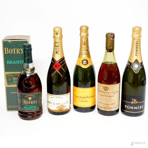 Lotto composto da quattro bottiglie di Champagne, un Auvenay 1970 le grand Bourgogne de Leroy e un Brandy Botrys