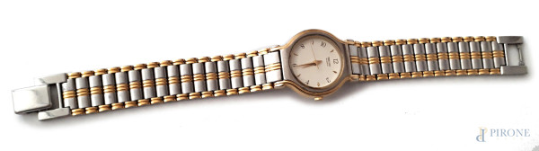 Seiko, orologio da polso vintage da donna, bracciale in acciaio cromato e dorato e quadrante tondo.
