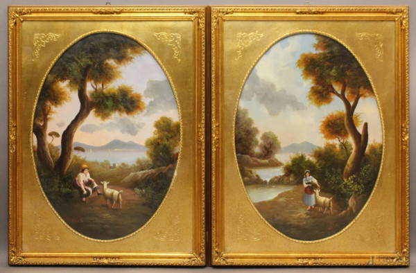 Coppia di dipinti raffiguranti paesaggi con pastori su sfondo costa napoletana, olio su tavola ad assetto ovale cm 70x50, entro cornice.