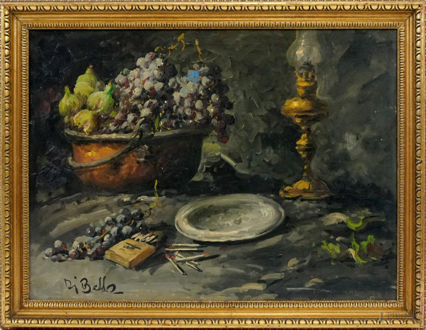 Tavola imbandita con frutta e lampada, olio su tela, cm 60x80, firmato Di Bella, entro cornice