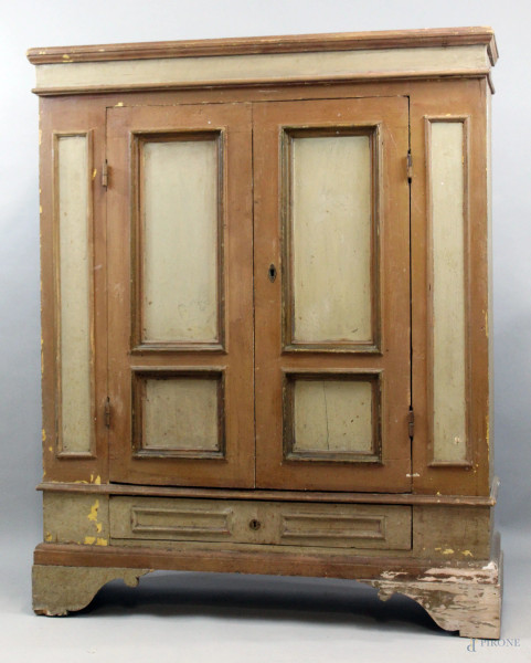 Armadietto in legno laccato, inizi XX secolo, fronte a due ante pannellate ed un cassetto, cm h 144x119x41, (difetti).