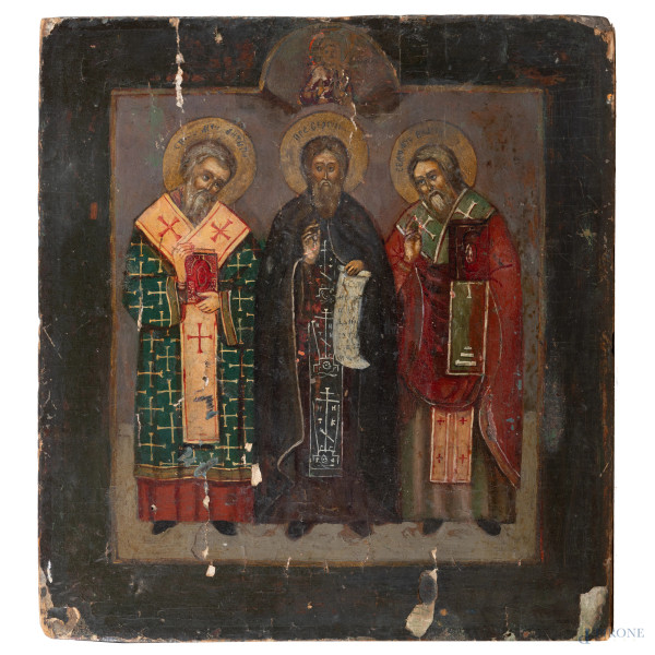 Icona raffigurante tre Santi, XIX secolo, tempera su tavola, cm 33x30,5, (segni di usura, difetti, rotture, mancanze, scalfiture, restauri)